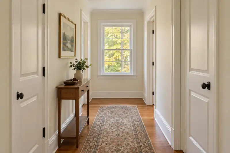 Illustrative after: refreshed hallway paint in an upstate New York home